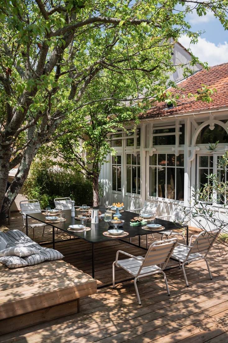 La même véranda et sa terrasse une fois terminées